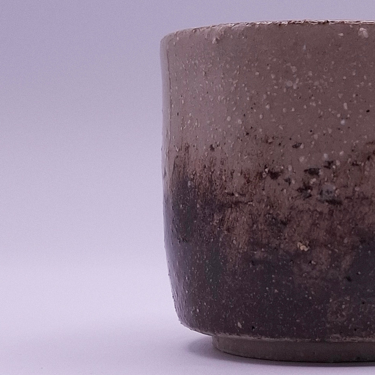 Handmade 200 ml Yunomi stoneware cup with earthy iron oxide and terra rosa surface