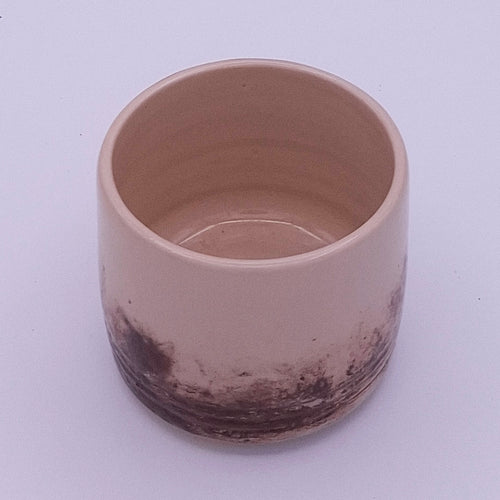 Handmade 200 ml Yunomi cups in cream stoneware with irregular natural iron oxide patterns, shown as a small group.