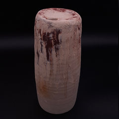 Handmade Rubble Vase I in cream and rust-coloured stoneware, showing its cylindrical form, textured surface and small opening for a single stem.