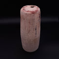 Handmade Rubble Vase I in cream stoneware with a rust-coloured surface created using natural Portuguese mineral pigment, shown against a black background.