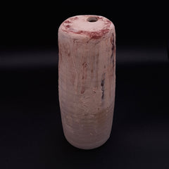 Handmade Rubble Vase I in cream stoneware with a rust-coloured surface created using natural Portuguese mineral pigment, shown against a black background.