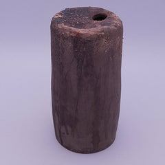Handmade Rubble Vase II in dark anthracite stoneware, showing its irregular iron oxide surface, textured rim and narrow opening against a light background.