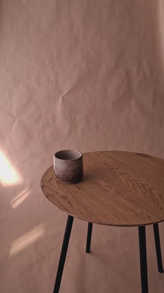 Handmade 200 ml ceramic Yunomi cup showing its rounded foot and textured stoneware body